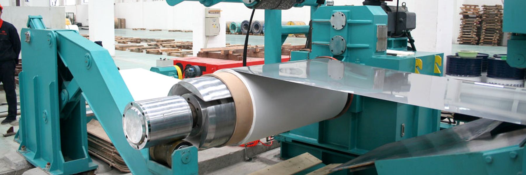 Slitting line processing a stainless steel coil at the Baowang Steel plant, Wuxi